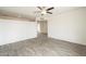 An alternate view of this large living area, which features wood-look tile flooring and neutral walls at 18009 N 15Th Dr, Phoenix, AZ 85023