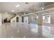 Large garage with high ceilings and triple doors at 12913 N 119Th St, Scottsdale, AZ 85259