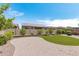 Large backyard with a grassy area and patio at 22630 E Mewes Rd, Queen Creek, AZ 85142