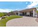 Landscaped backyard with patio and fire pit at 22630 E Mewes Rd, Queen Creek, AZ 85142