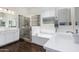 Elegant bathroom with double vanity, soaking tub, and walk-in shower at 22630 E Mewes Rd, Queen Creek, AZ 85142