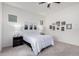 Spacious bedroom with a queen bed, carpet, and ceiling fan at 22630 E Mewes Rd, Queen Creek, AZ 85142
