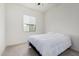 Cozy bedroom with a full-size bed and ceiling fan at 22630 E Mewes Rd, Queen Creek, AZ 85142