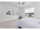 Well-lit bedroom featuring a queen bed and ample wall space at 22630 E Mewes Rd, Queen Creek, AZ 85142