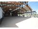 Open-air community pavilion with modern lighting and seating at 22630 E Mewes Rd, Queen Creek, AZ 85142
