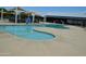 Community pool with shade structures and separate shallow area at 22630 E Mewes Rd, Queen Creek, AZ 85142