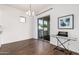 Bright dining area with sliding doors leading to backyard at 22630 E Mewes Rd, Queen Creek, AZ 85142
