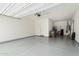 Spacious garage with ample storage shelving at 22630 E Mewes Rd, Queen Creek, AZ 85142