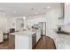 Modern kitchen with granite island and stainless steel appliances at 22630 E Mewes Rd, Queen Creek, AZ 85142