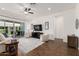 Spacious living room with sliding glass doors to backyard at 22630 E Mewes Rd, Queen Creek, AZ 85142