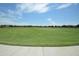 Expansive green space perfect for recreation and relaxation at 22630 E Mewes Rd, Queen Creek, AZ 85142