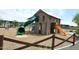Charming community playground with a large play structure at 22630 E Mewes Rd, Queen Creek, AZ 85142