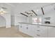 Open concept kitchen with white cabinets and gray countertops at 748 W Coolidge St, Phoenix, AZ 85013