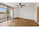 Bedroom with hardwood floors and access to balcony at 7575 E Indian Bend Rd # 2081, Scottsdale, AZ 85250