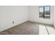 Bright bedroom featuring neutral carpeting and a window at 7575 E Indian Bend Rd # 2081, Scottsdale, AZ 85250
