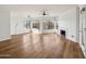 Spacious living room featuring hardwood floors and a fireplace at 7575 E Indian Bend Rd # 2081, Scottsdale, AZ 85250
