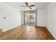Spacious living area featuring hardwood floors and sliding glass doors at 7575 E Indian Bend Rd # 2081, Scottsdale, AZ 85250