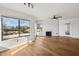 Living room with hardwood floors, fireplace and large windows at 7575 E Indian Bend Rd # 2081, Scottsdale, AZ 85250