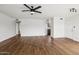 Living room with hardwood floors and kitchen access at 7575 E Indian Bend Rd # 2081, Scottsdale, AZ 85250