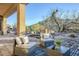 Peaceful patio with seating area and mountain views at 7737 E Shooting Star Way, Scottsdale, AZ 85266