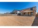 Large backyard surrounded by block wall fencing at 18002 W Vogel Ave, Goodyear, AZ 85338