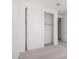 Bedroom with closet featuring sliding doors at 18002 W Vogel Ave, Goodyear, AZ 85338