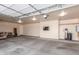 Spacious garage with an automatic door opener and ample storage space at 707 W Coles Rd, Phoenix, AZ 85041