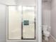 Bright bathroom with a shower featuring a glass door and a toilet in a separated space at 14244 W Indianola Ave, Goodyear, AZ 85395