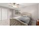 Bedroom with light and modern features provides relaxation and a well lit space at 14244 W Indianola Ave, Goodyear, AZ 85395