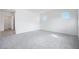 Large bedroom featuring neutral carpet, white walls and recessed lights offering ample space at 8746 W Denton Ln, Glendale, AZ 85305