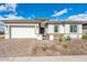 Charming single-story home featuring a brick driveway and a two-car garage at 8746 W Denton Ln, Glendale, AZ 85305