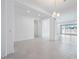 Open living room featuring modern finishes, recessed lighting and large sliding doors to the backyard at 8746 W Denton Ln, Glendale, AZ 85305
