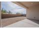 Covered patio with view of a large backyard at 17993 W Long Lake Rd, Goodyear, AZ 85338