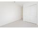 Simple bedroom with double door closet and carpet at 17993 W Long Lake Rd, Goodyear, AZ 85338
