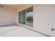 Covered patio with sliding glass doors leading to backyard at 17993 W Long Lake Rd, Goodyear, AZ 85338