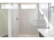 Clean shower with glass enclosure and subway tile at 17993 W Long Lake Rd, Goodyear, AZ 85338