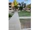 Ground level view of the community with a grassy area and walkways at 540 N May St # 3093, Mesa, AZ 85201