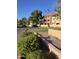 Building exterior showcasing landscaping and parking at 540 N May St # 3093, Mesa, AZ 85201