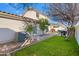 Landscaped backyard with patio and grill at 15603 N 79Th N Dr, Peoria, AZ 85382