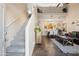 Interior view of staircase leading to upper level with living area view at 15603 N 79Th N Dr, Peoria, AZ 85382