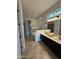 Spacious bathroom with double vanity, soaking tub, and walk-in shower at 6202 E Mckellips Rd # 310, Mesa, AZ 85215