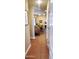 Inviting hallway leading to dining and living areas, featuring tile flooring and neutral tones at 7027 N Scottsdale Rd # 237, Scottsdale, AZ 85253