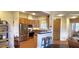 Well-appointed kitchen with stainless steel appliances, wood cabinets and breakfast bar at 7027 N Scottsdale Rd # 237, Scottsdale, AZ 85253