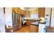 Charming kitchen with stainless steel appliances, wood cabinets and tile flooring at 7027 N Scottsdale Rd # 237, Scottsdale, AZ 85253
