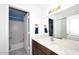 Clean bathroom featuring a vanity with countertop, mirror, and bath/shower combo at 1531 W Plana Ave, Mesa, AZ 85202