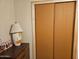 Bedroom featuring closet, chest of drawers, wooden trim, and natural light at 305 S Val Vista Dr # 37, Mesa, AZ 85204