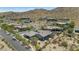Desirable desert home neighborhood with tile roof homes, desert landscaping, and views of the surrounding desert mountains at 8006 S 38Th Pl, Phoenix, AZ 85042