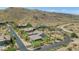 Scenic aerial view of desert community homes with mature landscaping, tile roofs, and mountain views at 8006 S 38Th Pl, Phoenix, AZ 85042