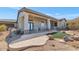 Home with a rock waterfall feature and views of the mountains at 8006 S 38Th Pl, Phoenix, AZ 85042