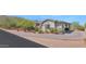 Charming single-story home featuring a stucco exterior, covered parking, desert landscaping, and a well-maintained driveway at 8006 S 38Th Pl, Phoenix, AZ 85042